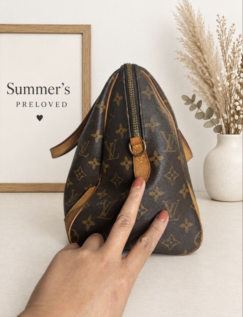 Elvira Retiro PM (Category: Luxury Bags & Wallets) located in Taguig. Submitted by summers.preloved (Listing ID 1463434464, Image 3). Description: 👜 Bag Details 🤎 Exterior: Brown Monogram coated canvas featuring the recognizable Elvira initials and floral motifs 🍯 Leather trim: Natural cowhide/vachetta-style leather on the handles, upper panels, corner reinforcements, and piping, with a honey-brown patina 👜 Handles: Two broad leather handles 