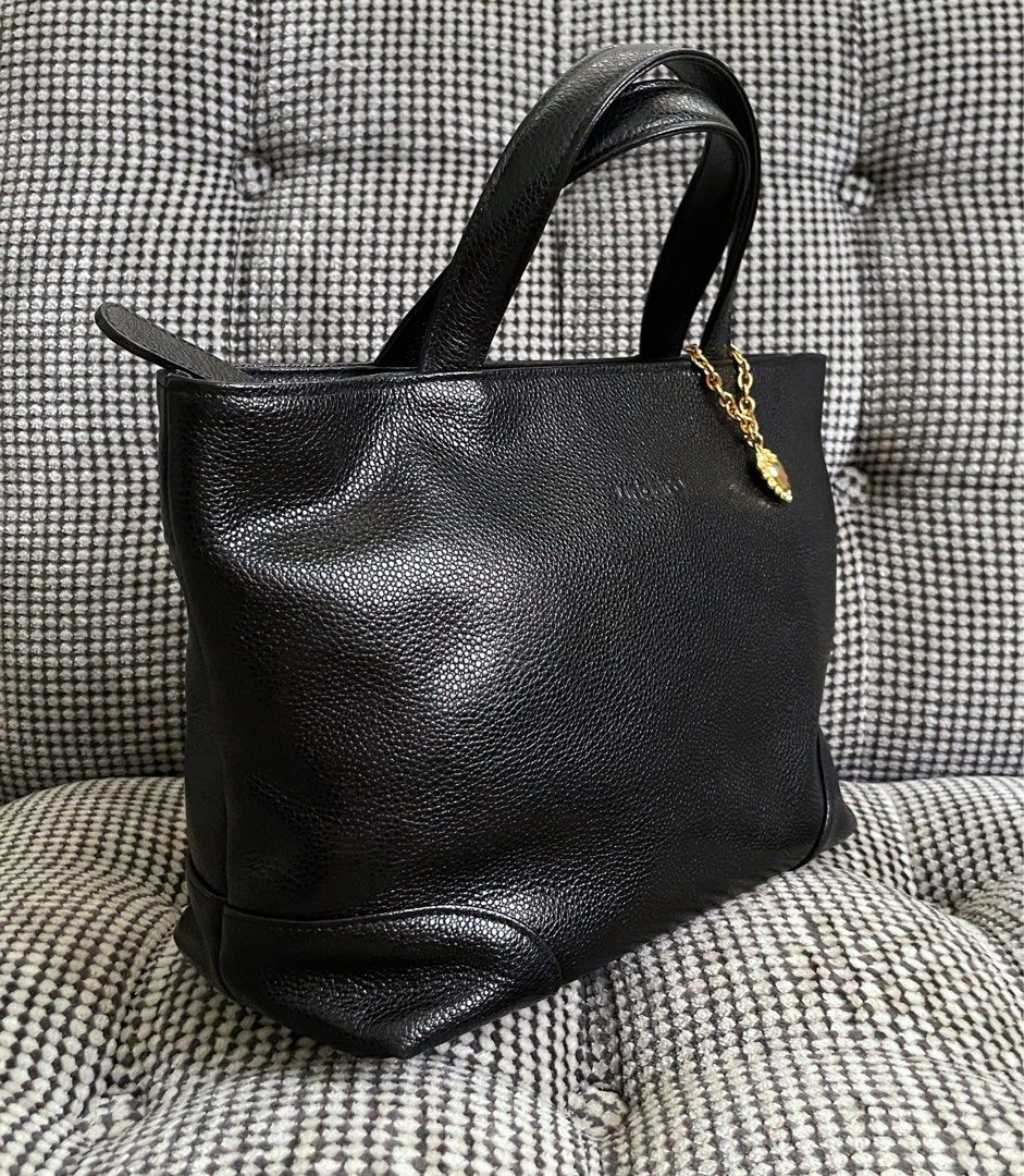 Emmanuel Ungaro Genuine Leather handbag (Category: Shoulder Bags) located in Bulacan. Submitted by thriftbagcollections (Listing ID 1463441621, Image 3). Description: Emmanuel Ungaro Genuine Leather,Excellent condition!Approx:H-7”W-11”D-4” handle 4”.