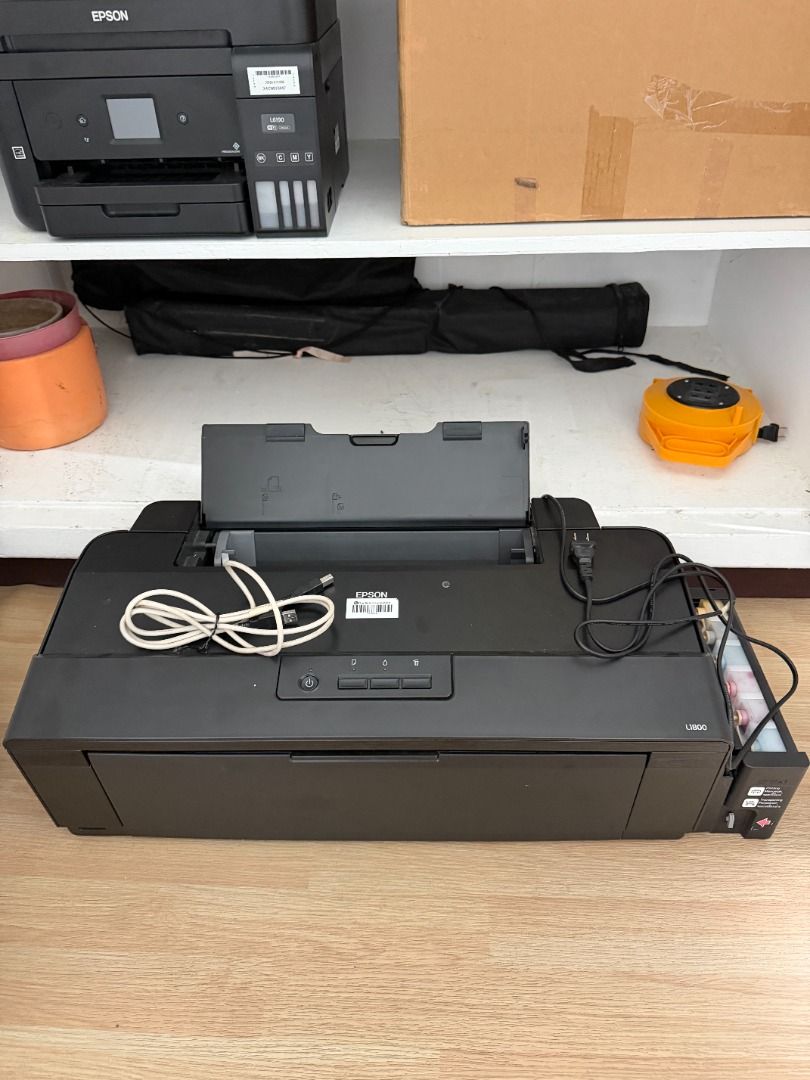 Epson L1800 (Category: Printers, Scanners & Copiers) located in Quezon City. Submitted by azzyabrencillo (Listing ID 1463399086, Image 2). Description: Functions: Print -Working / powers on -Needs ink to fully test printing quality -Print quality not verified during testing due to no ink -With smoothless Function -Cable included -A3+ capable printer, suitable for photo and high-quality document printing 📌 IMPORTANT -All units are sold AS-IS / WH