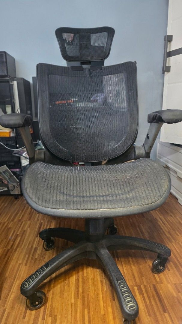 Ergonomic Mesh Office Chair with Headrest (Category: Office Furniture & Fixtures) located in Caloocan City. Submitted by marces (Listing ID 1463378886, Image 2). Description: - Comfortable full mesh office chair - Added headrest for extra support - Swivels and rolls smoothly (upgraded wheels) - signs of wear - Issue: gas lift not working.