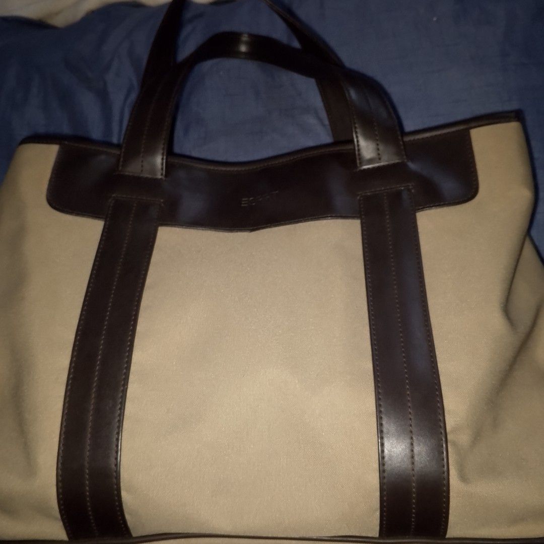 Esprit Canvas and Leather Tote Bag (Category: Tote Bags) located in Antipolo. Submitted by jomavi20 (Listing ID 1463336118, Image 2). Description: - Esprit tote bag - Color: Beige canvas with dark brown leather accents - Closure: Top zip - Straps: Comfortable shoulder straps - Features: Plenty of interior space - Style: Simple and classic design - Ideal for: Everyday use or travel.