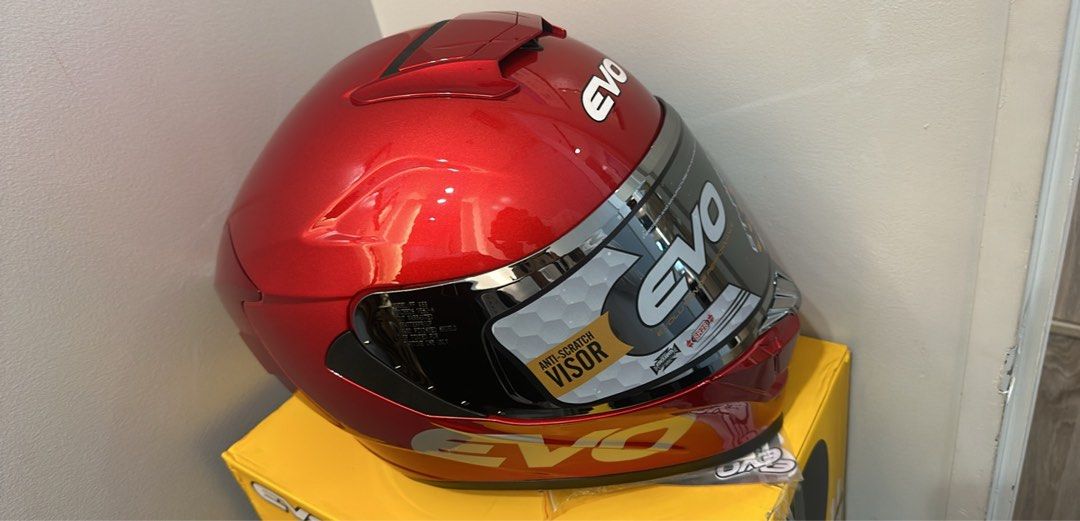 EVO GT-PRO Motorcycle Helmet - Red (Category: Helmets and other Riding Gears) located in Manila. Submitted by markbay22974216 (Listing ID 1463393387, Image 2). Description: - EVO GT-PRO Helmet - Size: Medium - Color: Metallic Red - Visor: Anti-scratch coating - Includes: Original box - Ideal for: Riding.