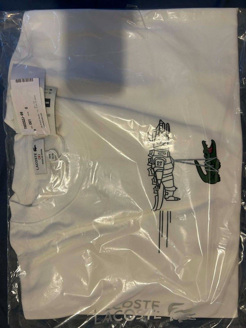 Exclusive Lacoste White Godzilla T-Shirt (Category: Tshirts & Polo Shirts ) located in Pasig City. Submitted by _thriftsbyb (Listing ID 1463518963, Image 2). Description: - White Lacoste T-shirt - Size 6 - Unique graphic prints - Iconic crocodile logo - Brand new with original packaging and tags attached - Ideal for casual wear Shirt 11k each polo shirt 17k.