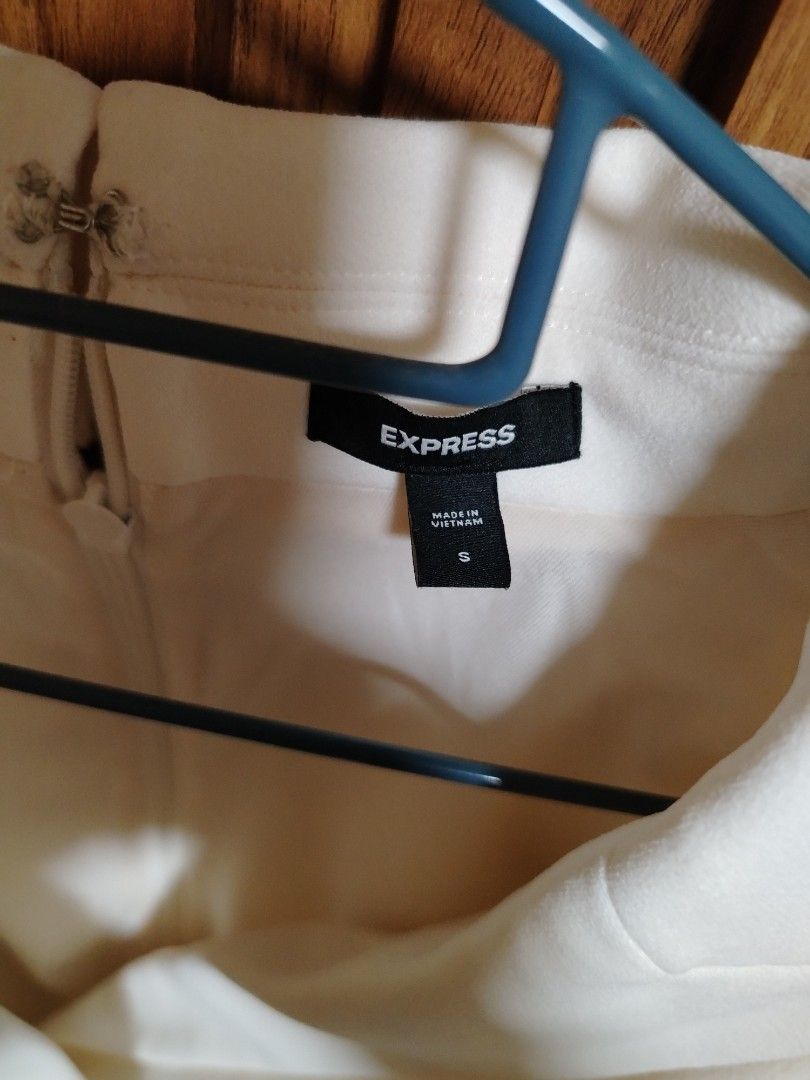 Express cutout mini blazer dress (Category: Dresses) located in Cavite. Submitted by oncetop_declutter (Listing ID 1463550529, Image 3). Description: Cutout Mini Blazer Dress. It features an ivory white color, structured notch lapels, a plunging V-neckline, cap sleeves, and distinctive side waist cutouts that bridge the tailored top bodice with a sleek mini skirt. *Brand new without hangtag *never used shipping fee c/O buyer.