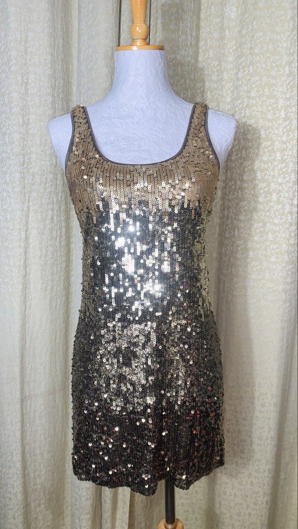 Express Sequin Ombre Tank Dress (Category: Dresses) located in Dagupan City. Submitted by sj_styles0910. (Listing ID 1463534187, Image 1). Description: - Sparkly ombre sequin dress from Express - Gold to black gradient design - Tank style with a flattering scoop neck - Ideal for parties, events, or a night out - Size: XS.