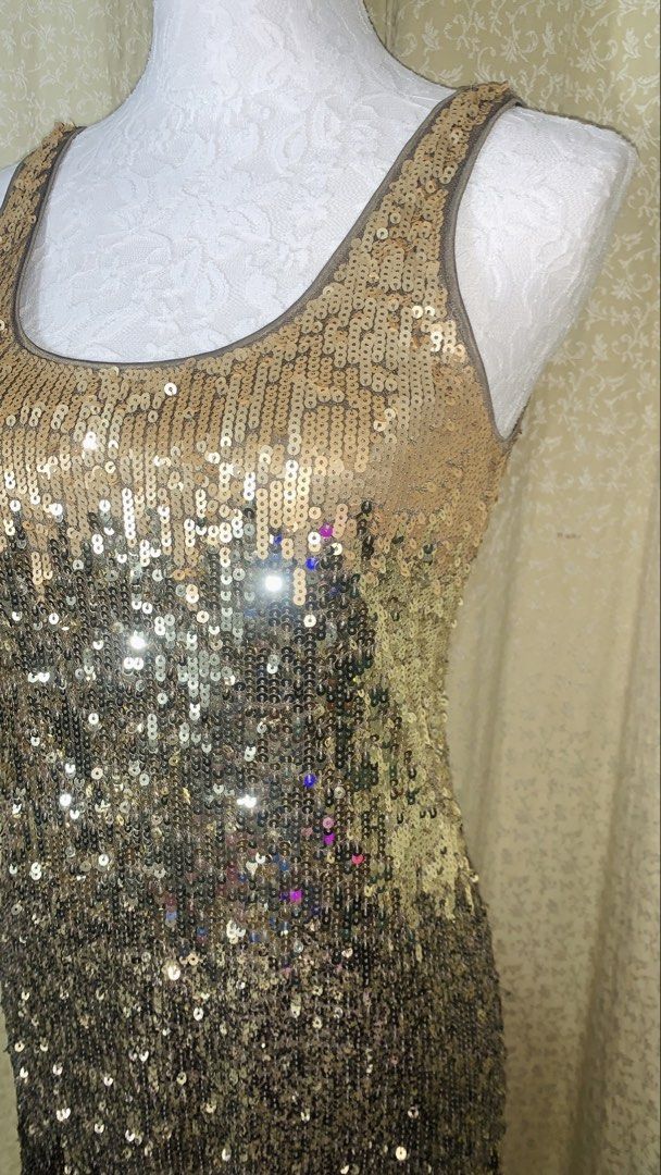 Express Sequin Ombre Tank Dress (Category: Dresses) located in Dagupan City. Submitted by sj_styles0910. (Listing ID 1463534187, Image 2). Description: - Sparkly ombre sequin dress from Express - Gold to black gradient design - Tank style with a flattering scoop neck - Ideal for parties, events, or a night out - Size: XS.