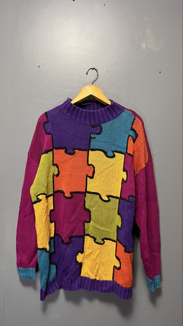 Extra Point Puzzle Piece Knit Sweater (Category: Coats, Jackets and Outerwear) located in Cabuyao City. Submitted by bulandos (Listing ID 1463439176, Image 1). Description: - Brand: Extra Point - Style: Puzzle piece knit sweater - Design: Colorful patchwork (purple, orange, yellow, teal, magenta) - Features: Long sleeves, ribbed cuffs and hem - Material: Cotton and ramie blend - Perfect for: Making a statement.