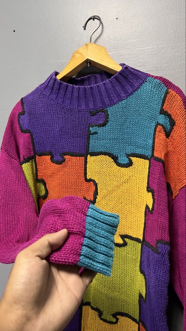 Extra Point Puzzle Piece Knit Sweater (Category: Coats, Jackets and Outerwear) located in Cabuyao City. Submitted by bulandos (Listing ID 1463439176, Image 2). Description: - Brand: Extra Point - Style: Puzzle piece knit sweater - Design: Colorful patchwork (purple, orange, yellow, teal, magenta) - Features: Long sleeves, ribbed cuffs and hem - Material: Cotton and ramie blend - Perfect for: Making a statement.