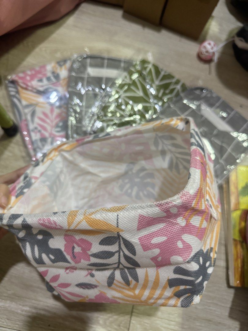 Fabric Storage Basket (Category: Storage Boxes & Baskets) located in Quezon City. Submitted by Solanawear (Listing ID 1463333116, Image 1). Description: - Cute fabric storage basket - Ideal for organizing small items like accessories, stationery, or toiletries. - White interior. - Folds flat for convenient storage when not in use. - Multiple designs available..
