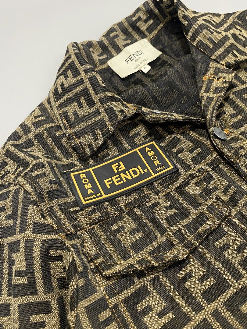 ‘FENDI ZUCCA MONOGRAM DENIM JACKET’ (Category: Coats, Jackets and Outerwear) located in San Jose. Submitted by retro.co (Listing ID 1463456850, Image 3). Description: ‘FENDI ZUCCA MONOGRAM DENIM JACKET’ Features: - FRONT PATCH - FENDI ZUCCA PATTERN - JACQUARD - FENDI ENGRAVE ON BUTTONS •In Excellent condition •Flaws: NO MAJOR FLAWS •Color rate: (9.5/10) •Dimes: (L): 20 (W): 23.5 READ BEFORE PURCHASING -WORLDWIDE SHIPPING -NO RETURN -Please check 