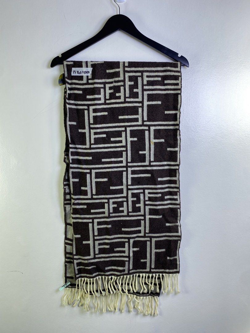 Fendi FF Monogram Scarf Brown Beige (Category: Scarves) located in Manila. Submitted by declutterpromax (Listing ID 1463402675, Image 1). Description: - Classic Fendi scarf - Iconic FF monogram pattern - Color: Brown and beige - Frayed fringe at the ends - Made in Italy - Dimensions: Approx. 15 x 60 inches - Condition: Small yellow mark on the pattern.