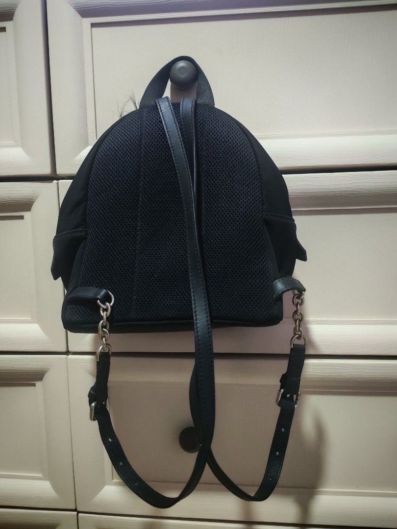 Fendi monster bag pack (Category: Backpacks) located in Manila. Submitted by jeraldliam77253 (Listing ID 1463355599, Image 2). Description: - Authentic Black Fendi Backpack - Iconic Monster Eyes Design with Yellow Leather Accents - Fluffy Fur Pom Pom Detail on Top - Secure Zipper Closure - Adjustable Straps for Comfortable Fit - Made in Italy - Ideal for Everyday Use or as a Fashion Statement.