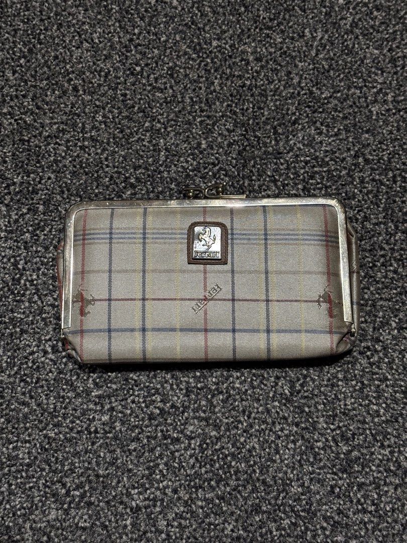 Ferrari Plaid Kiss-lock Pouch (Category: Luxury Bags & Wallets) located in Bulacan. Submitted by thriftstarph (Listing ID 1463473671, Image 1). Description: PLEASE READ THE DESCRIPTION BELOW ‼️ Ferrari Plaid Kiss-lock Pouch Make up Bag, Wallet and Pouch From: Japan Good as nee.