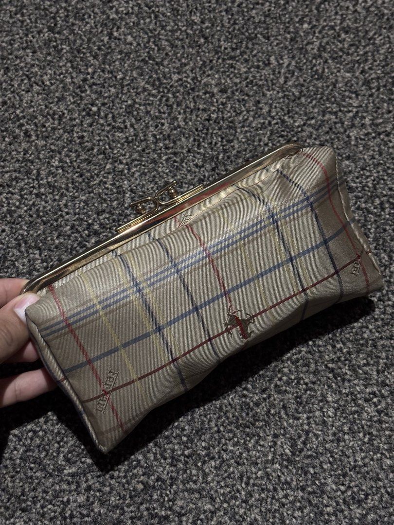 Ferrari Plaid Kiss-lock Pouch (Category: Luxury Bags & Wallets) located in Bulacan. Submitted by thriftstarph (Listing ID 1463473671, Image 3). Description: PLEASE READ THE DESCRIPTION BELOW ‼️ Ferrari Plaid Kiss-lock Pouch Make up Bag, Wallet and Pouch From: Japan Good as nee.