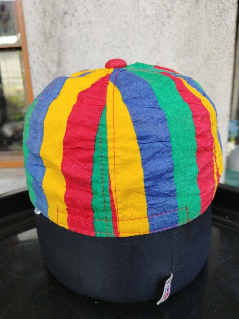 Fiorucci 80's rare hat (Category: Caps & Hats) located in Legazpi City. Submitted by genobecollectives (Listing ID 1463331363, Image 2). Description: 80s Fiorucci rare hat 3,00 free ship - Vibrant multi-colored stripe design - Classic red brim - Vintage item, condition rated 7/10 - Rare collectible piece - Adds a unique retro flair to your style -one size fits most dm.