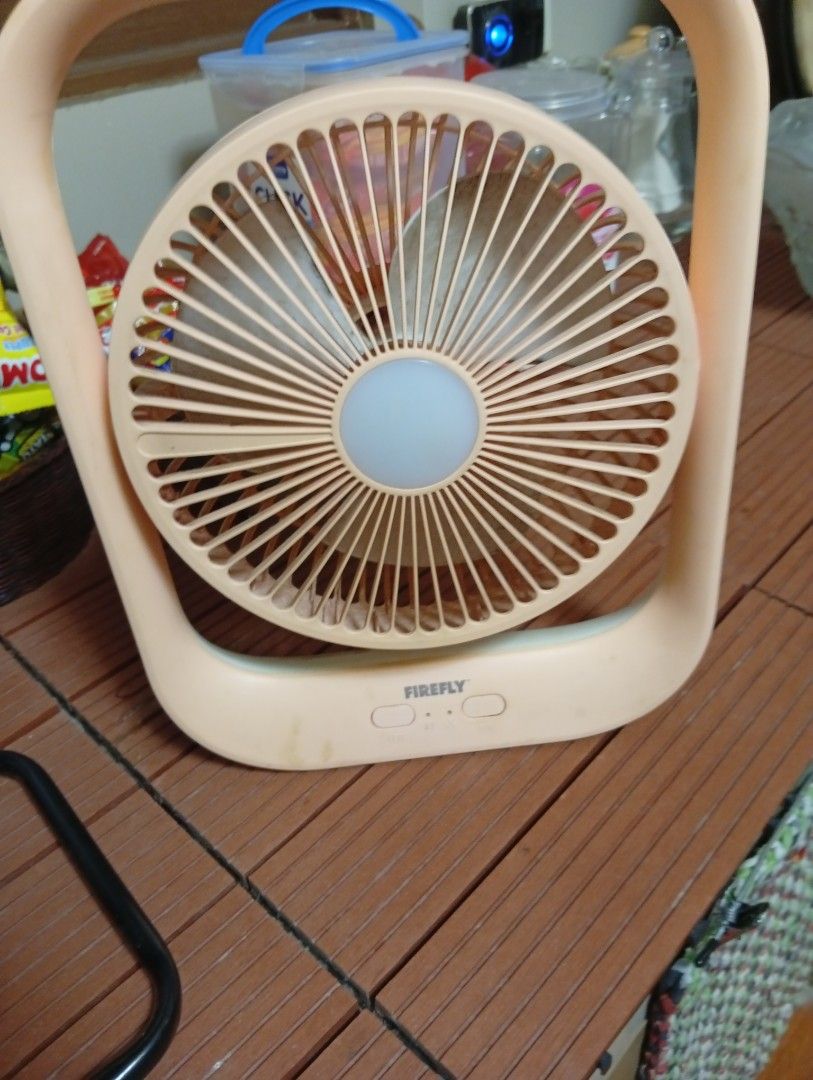 Firefly Portable Desk Fan with LED Light (Category: Fans) located in Manila. Submitted by matchpoint (Listing ID 1463388781, Image 1). Description: RFS: spare, decluttering, haven't used in a long time - Portable desk fan from Firefly - micro usb charge port - Built-in LED light - Three speed settings (indicated by dots) - works well, no issues.