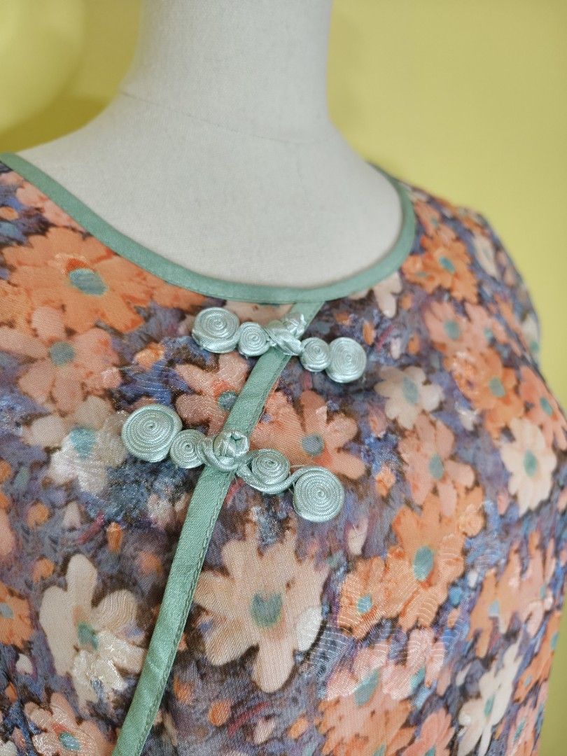 Floral Chinese dress (Category: Dresses) located in Bacoor. Submitted by fernandezjekri (Listing ID 1463479146, Image 3). Description: -sheer floral dress with orange, blue, and white flowers. -Features a light blue trim and mandarin collar -Cute frog buttons at the neckline - Short sleeves and a ruffled hem -best fit semi-medium ( with zipper on side) payment thru Gcash and BDO.