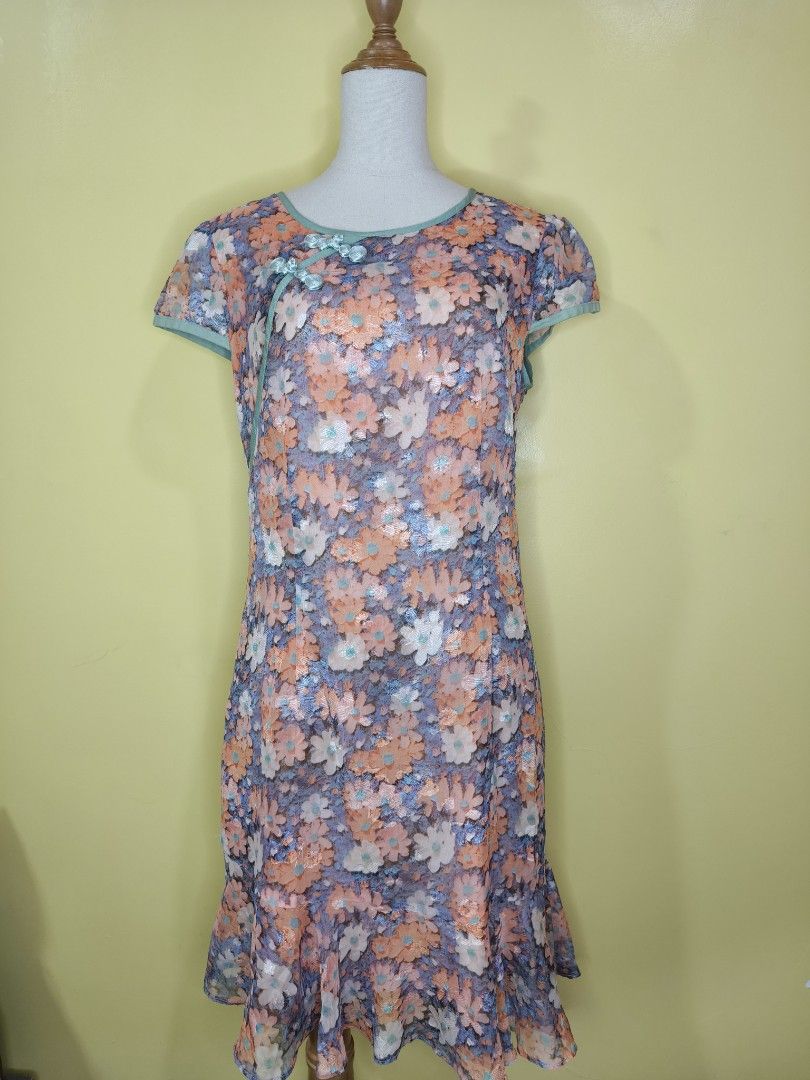 Floral Chinese dress (Category: Dresses) located in Bacoor. Submitted by fernandezjekri (Listing ID 1463479146, Image 1). Description: -sheer floral dress with orange, blue, and white flowers. -Features a light blue trim and mandarin collar -Cute frog buttons at the neckline - Short sleeves and a ruffled hem -best fit semi-medium ( with zipper on side) payment thru Gcash and BDO.