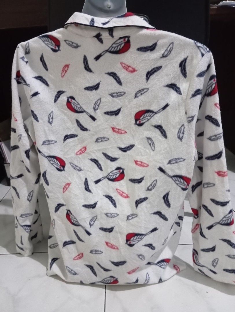 Fluffy Pajama Top with Bird and Feather Print (Category: Undergarments & Loungewear) located in Dasmarinas. Submitted by kei05 (Listing ID 1463444768, Image 2). Description: - Super soft and cozy fabric - Cute all-over bird and feather print - Long sleeves - Button-up front - Ideal for lounging at home - Great for cooler nights - Comfortable and warm.