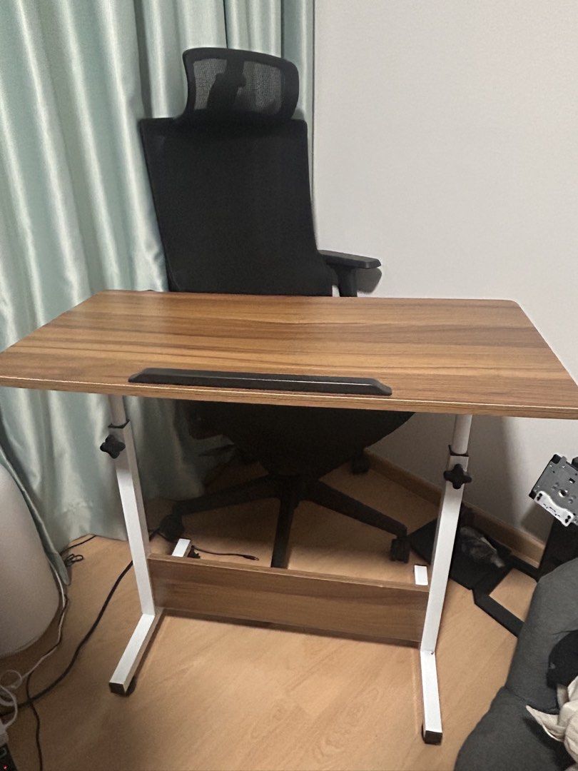 Foldable table (Category: Tables & Sets) located in Singapore. Submitted by bigminiworld (Listing ID 1463496319, Image 1). Description: Table size is 80cm x 40cm. Height is adjustable. Own collection.