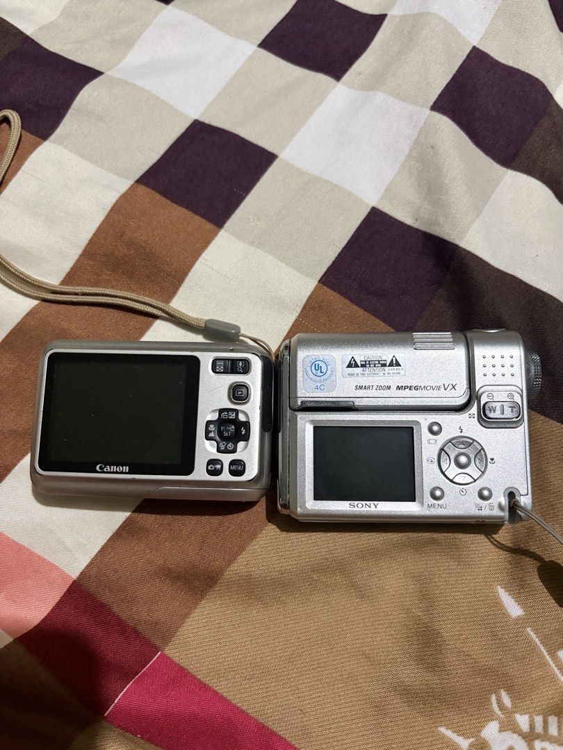 FOR REPAIR CAMERA/ FOR PARTS (Category: Cameras) located in General Trias. Submitted by tiredbread_ (Listing ID 1463517352, Image 1). Description: the sony one is rare and is in very very good condition in cosmetic aspect. i am not sure about the issue with the canon one..