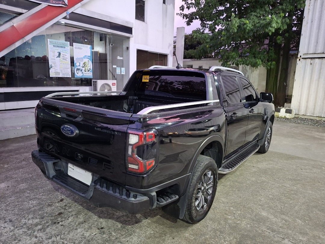 Ford Ranger (Category: Used Cars) located in Quezon City. Submitted by zenpips (Listing ID 1463358175, Image 3). Description: 🚨 FOR SALE — 2024 FORD RANGER WILDTRAK 4x4 🚨 🔥 2.0L Bi-Turbo Diesel | 4x4 | Automatic 🚘 VEHICLE DETAILS • Model: Ford Ranger Wildtrak 4x4 • Year: 2024 • Engine: 2.0L Bi-Turbo Diesel • Transmission: Automatic • Mileage: 54,000 KM • Ownership: First Owner • OR/CR: Complete • Original Purchase Price: ₱1,900,000 • Conditio