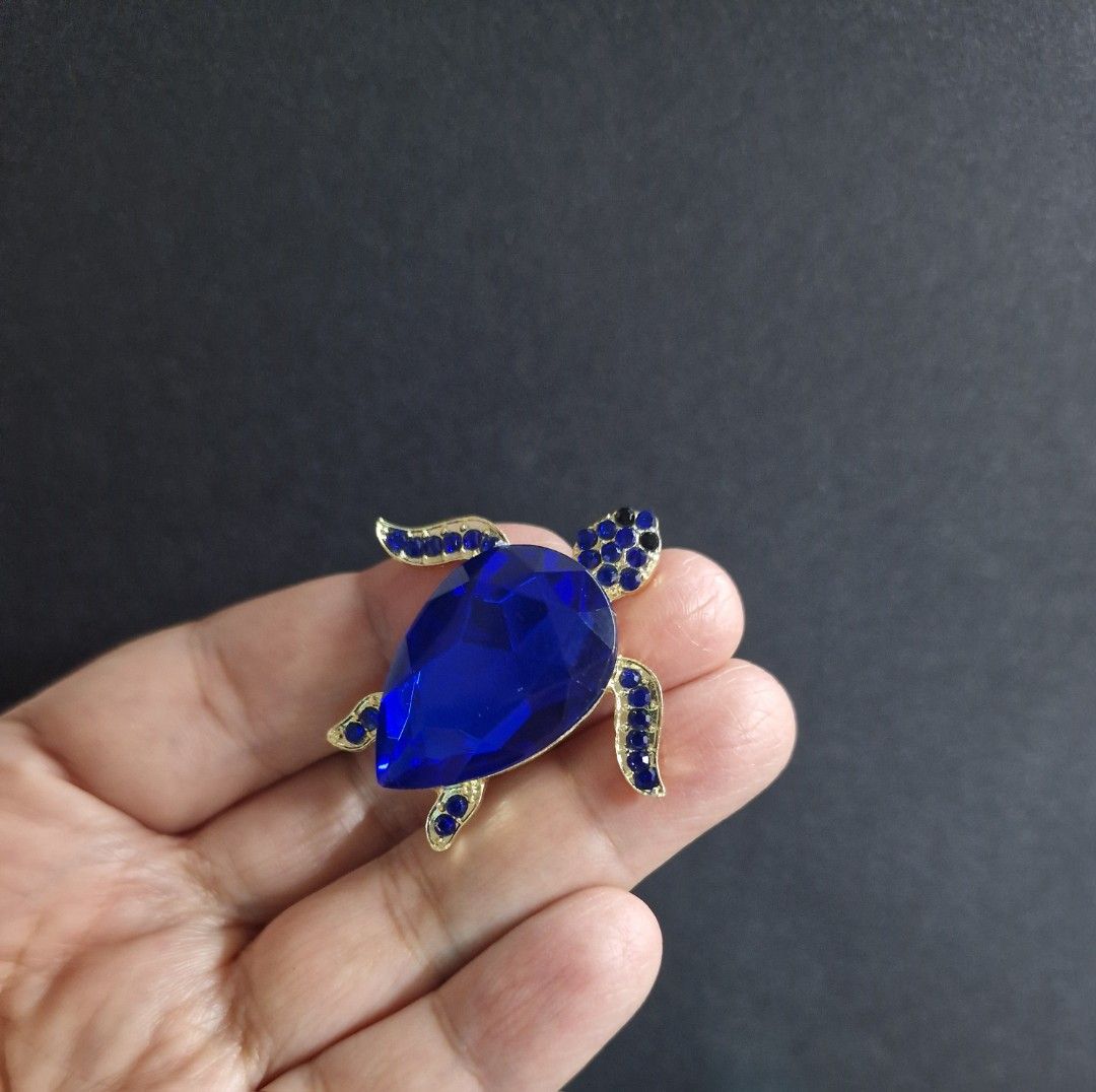 Freshwater Turtle Brooch (Category: Brooches) located in Taguig. Submitted by mommaschoice (Listing ID 1463339466, Image 2). Description: Brand new Unisex use Elegantly crafted design Adorned w/Blue rhinestones Lightweight won't damage the fabric Ships nationwide.