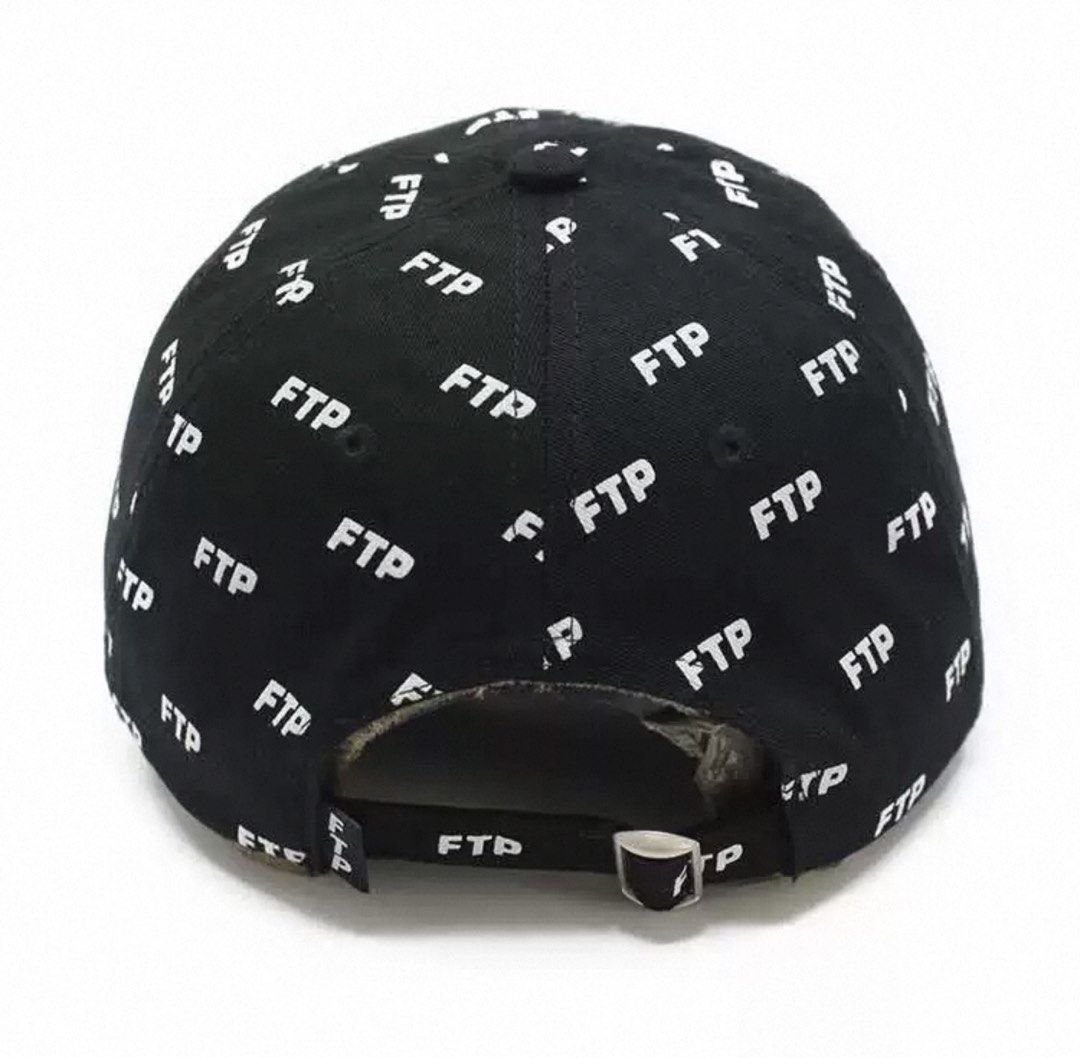 FTP All Over Print Black Baseball Cap (Category: Caps & Hats) located in Agdangan. Submitted by theftpplug (Listing ID 1463467305, Image 2). Description: - Classic black baseball cap - Features an all-over white FTP logo - Adjustable strap at the back for a custom fit - Ideal for everyday wear - Clearly displays the brand logo Pre order 3500.