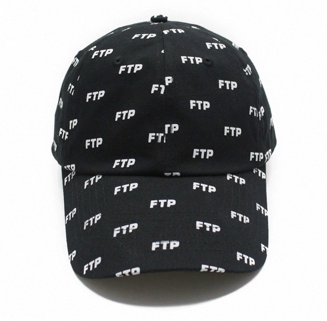 FTP All Over Print Black Baseball Cap (Category: Caps & Hats) located in Agdangan. Submitted by theftpplug (Listing ID 1463467305, Image 1). Description: - Classic black baseball cap - Features an all-over white FTP logo - Adjustable strap at the back for a custom fit - Ideal for everyday wear - Clearly displays the brand logo Pre order 3500.