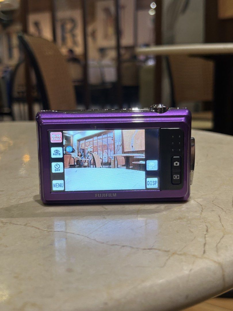 Fujifilm FinePix Z Digital Camera Digicam (Category: Cameras) located in Lagonoy. Submitted by nadayojiii (Listing ID 1463392087, Image 2). Description: Fujifilm FinePix Z💜 NO FUNCTIONAL ISSUES ALL WORKING flash working zoom working touch screen(slightly hard touch because of hairline crack; still touch responsive) clear lcd!! CRISP SHOTS✨ inclusions: unit battery sd card charger strap stickers .