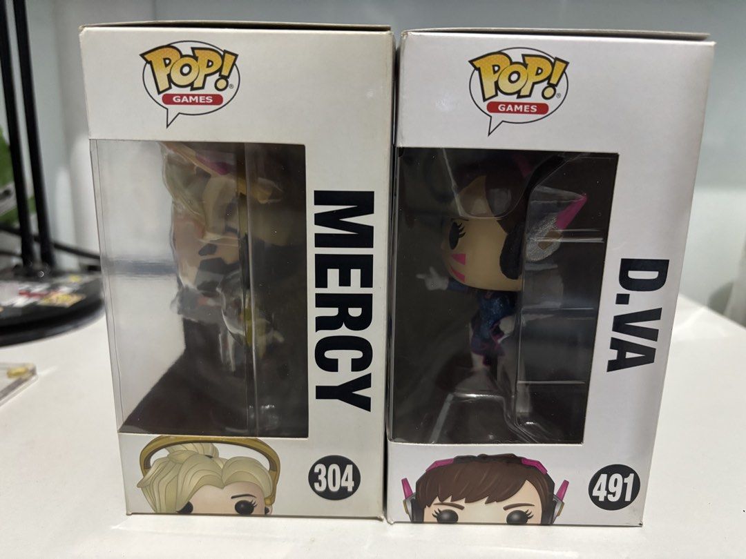 Funko Pop Overwatch d.va 491 & Mercy 304 Bundle (Category: Designer & Blind Box Toys) located in Manila. Submitted by lvlup_toys (Listing ID 1463436730, Image 2). Description: Please Take Time to Read !!! All in good Condition unless stated Protectors Included funko overwatch set of 2 D.VA #491 (Diamond Collection SE) Mercy #304 Condition slight yellowing due to age Payment: Bank transfer (BPI/GOTYME) MoS: For Pickup ot Shipping only (LALAMOVE/GR