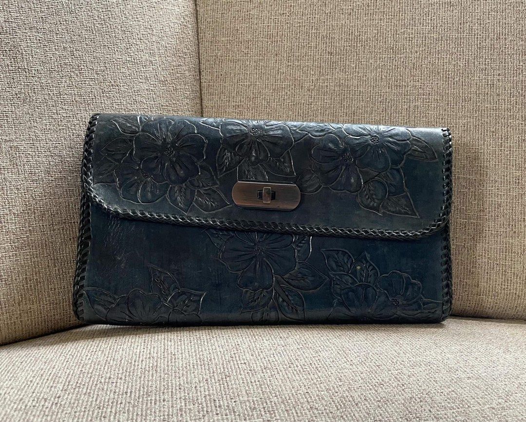 Genuine Leather Handtooled clutch, (Category: Clutches) located in Bulacan. Submitted by thriftbagcollections (Listing ID 1463464203, Image 2). Description: Genuine Leather Handtooled clutch,Good condition!Approx:H-6”W-10”.