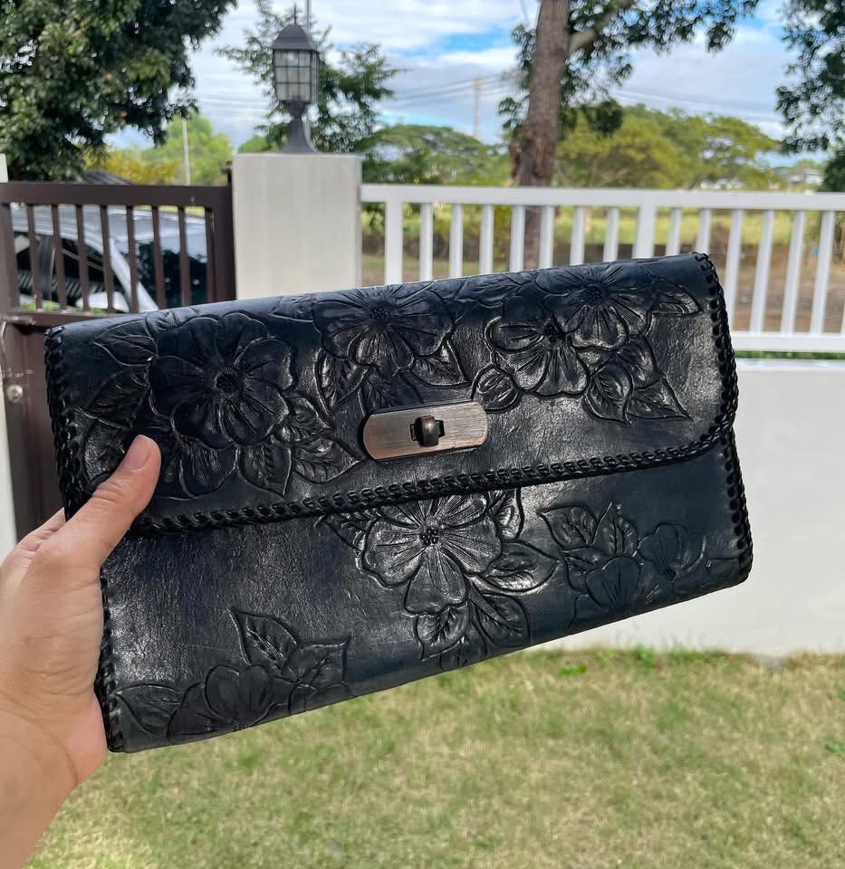 Genuine Leather Handtooled clutch, (Category: Clutches) located in Bulacan. Submitted by thriftbagcollections (Listing ID 1463464203, Image 1). Description: Genuine Leather Handtooled clutch,Good condition!Approx:H-6”W-10”.