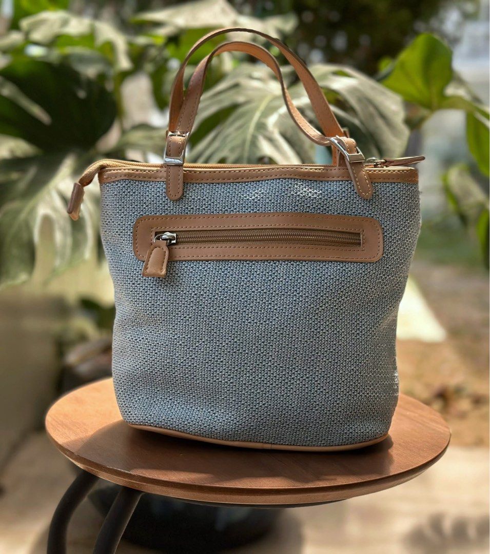 Gianni Valentino Italy bag (Category: Shoulder Bags) located in Bulacan. Submitted by thriftbagcollections (Listing ID 1463401825, Image 2). Description: Gianni Valentino Italy bag,canvas material with leather lining.Excellent condition! Approx: 8.5”W-10”D-4.7”handle 4.5”.