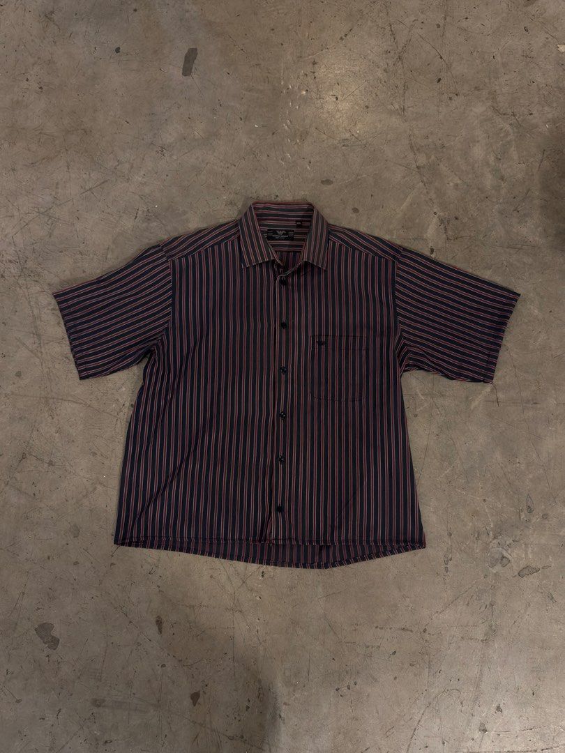 Giorgio Armani Boxy Cropped Polo(Reworked) (Category: Tshirts & Polo Shirts ) located in Samal. Submitted by jorts26 (Listing ID 1463372641, Image 1). Description: Giorgio Armani Boxy Cropped Polo(Reworked) Dimes:24x26 Flaws:None Price:₱450 Condition:Excellent Location:Bataan Shipping:J&T or LBC Negotiable .