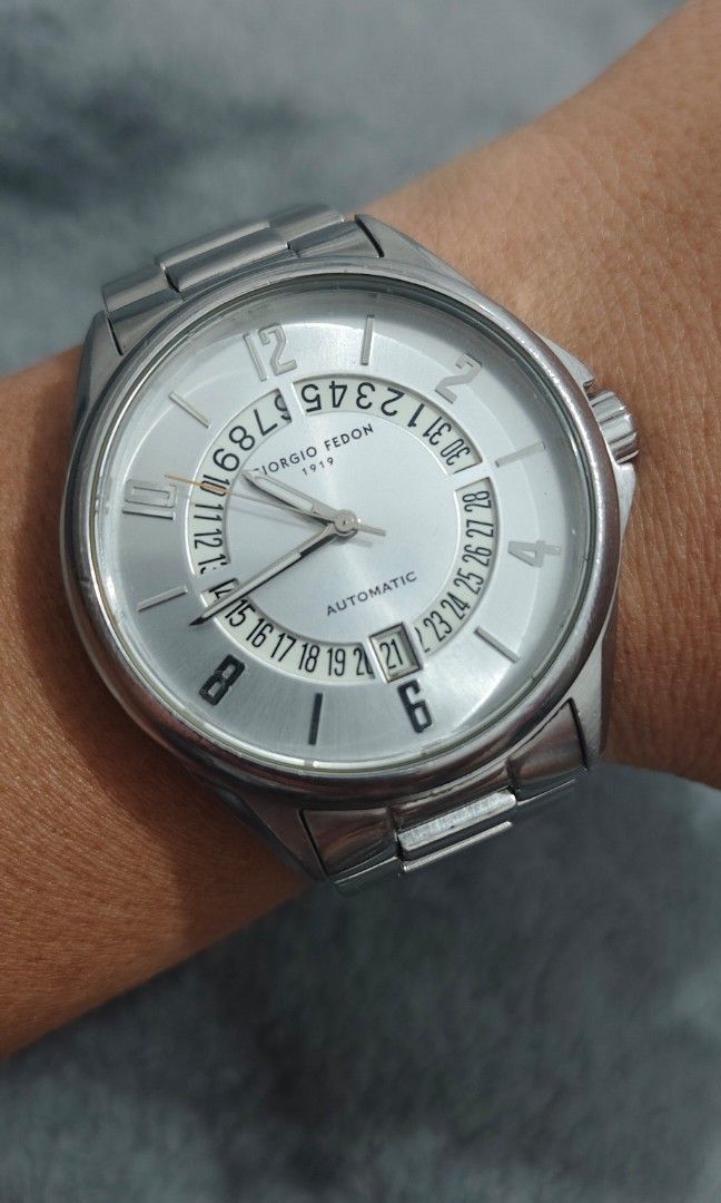 Giorgio Fedon 1919 (Category: Men's Watches) located in Cebu City. Submitted by aceoftime (Listing ID 1463489396, Image 2). Description: In good working condition Automatic movt with retrograde design calendar All in stainless steel Flawless crystal ( No scratches) Watch only Our Guarantee: 💯 Authentic All watches are checked by our experienced technician to ensure good functionality Please manage your expectations since these are preloved watch