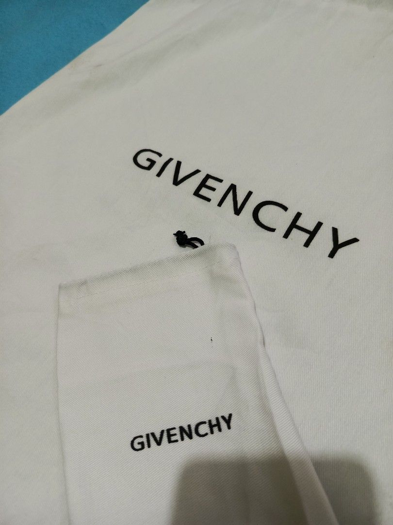 Givenchy Dust Bag Storage Pouch (Category: Luxury Bags & Wallets) located in Irosin. Submitted by whanchore55263 (Listing ID 1463183708, Image 2). Description: - Authentic Givenchy dust bag - Includes a smaller pouch - Ideal for storing handbags or shoes - Protects items from dust and scratches - Great for travel or closet organization.