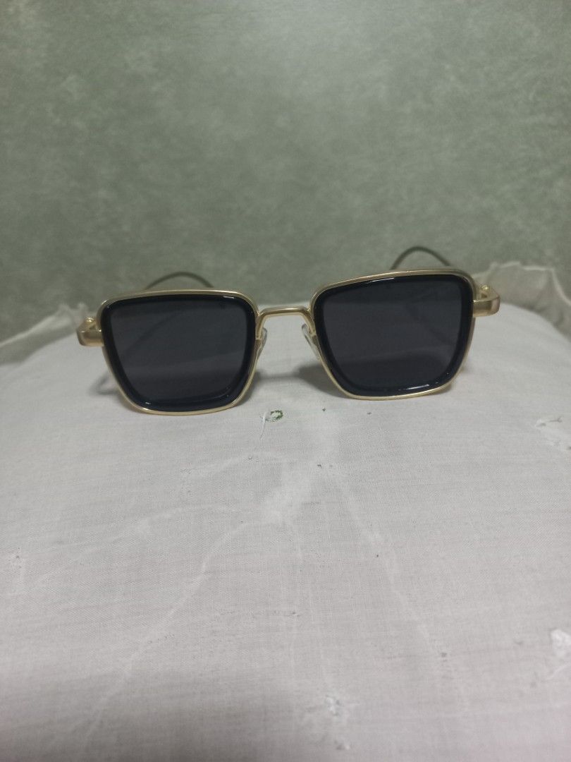 Gold Frame Square Sunglasses (Category: Sunglasses & Eyewear) located in Quezon City. Submitted by msdcshop (Listing ID 1463341366, Image 1). Description: - Stylish square sunglasses - Cool gold frames - Dark lenses for excellent sun protection - Perfect accessory for any outfit - Ideal for sunny days out - Ready for a new owner.