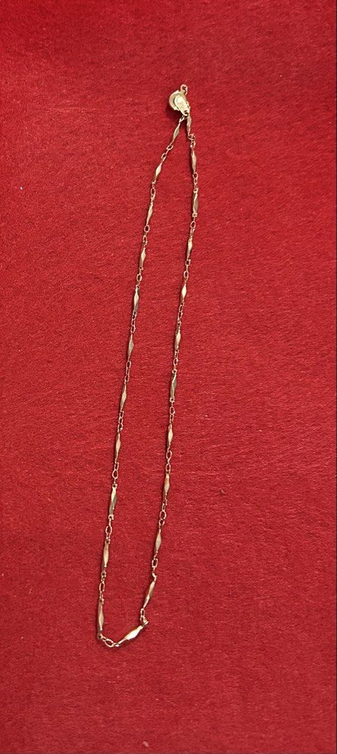 Gold tone necklace with snap button clasp (Category: Necklaces) located in Imus. Submitted by swiftfire_39c538 (Listing ID 1463553260, Image 2). Description: Gold tone necklace with snap button clasp With markings on clasp PAT 2007 16 inches SRP 1,240 From Japan Surplus .