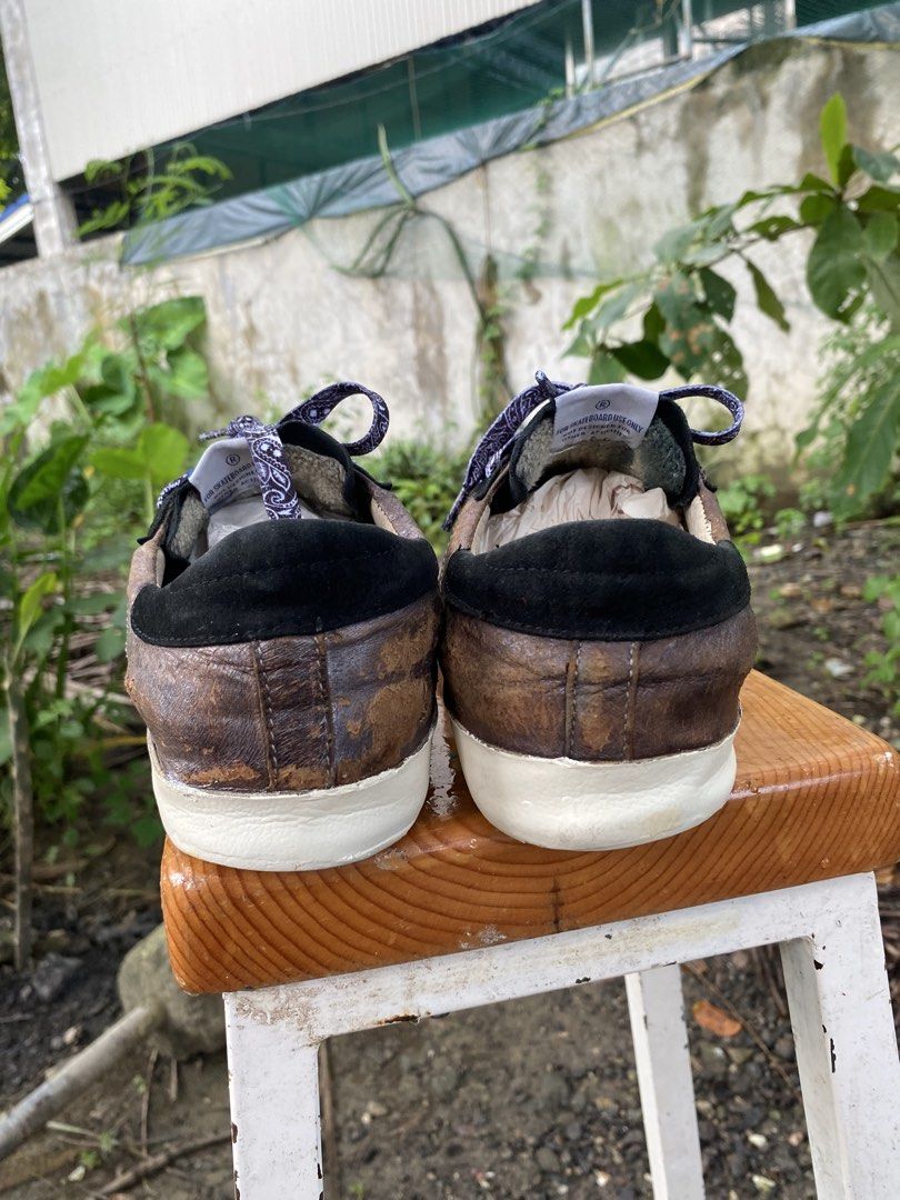 Golden Goose Superstar Sneakers (Category: Sneakers) located in Iloilo. Submitted by resellmpg (Listing ID 1463553910, Image 3). Description: - Authentic Golden Goose Superstar sneakers - Color: Black suede with brown leather accents - Signature gold star detail - Unique bandana-style laces - Shows expected wear on leather, adding to character - Ideal for stylish everyday wear.