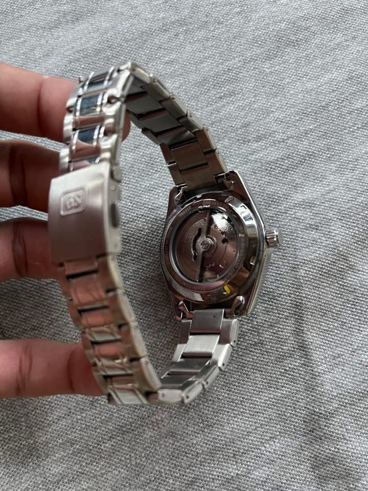 Grand Seiko Automatic Open Back GS Crown (Category: Luxury Watches) located in Manila. Submitted by jaivrgr22 (Listing ID 1463397439, Image 2). Description: Excellent Condition All Working / No issue With Hard Box & Paper Bag .
