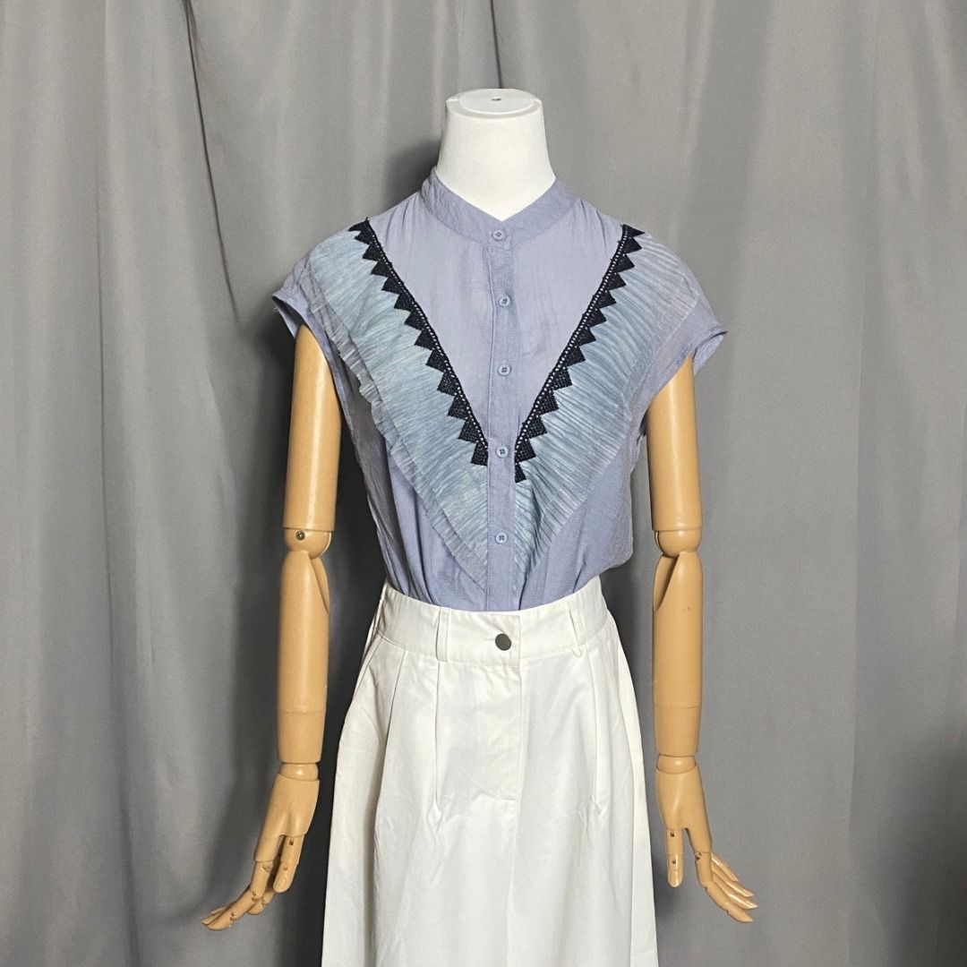 Grayish blue button-down top with black lace ruffle trim (Category: Shirts) located in Las Pinas. Submitted by ipickyou (Listing ID 1463474476, Image 1). Description: Unwashed 𝗠𝗲𝗮𝘀𝘂𝗿𝗲𝗺𝗲𝗻𝘁𝘀 𝘄𝗵𝗲𝗻 𝗹𝗮𝗶𝗱 𝗳𝗹𝗮𝘁: -Armpit to armpit: 17 1/2” -Length: 23”.