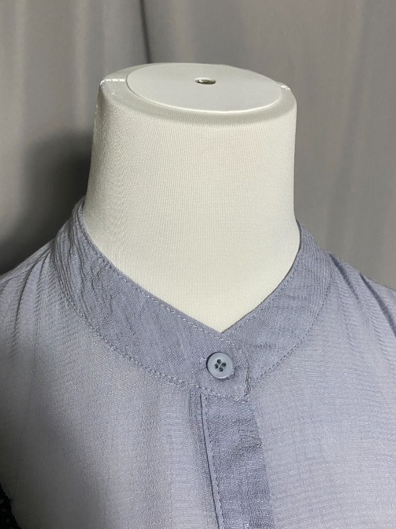Grayish blue button-down top with black lace ruffle trim (Category: Shirts) located in Las Pinas. Submitted by ipickyou (Listing ID 1463474476, Image 3). Description: Unwashed 𝗠𝗲𝗮𝘀𝘂𝗿𝗲𝗺𝗲𝗻𝘁𝘀 𝘄𝗵𝗲𝗻 𝗹𝗮𝗶𝗱 𝗳𝗹𝗮𝘁: -Armpit to armpit: 17 1/2” -Length: 23”.