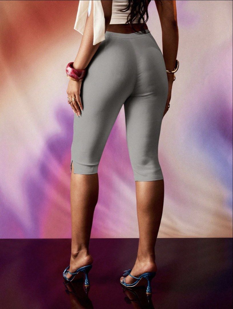 Grey Capri Pants with Side Slits (Category: Other Bottoms) located in Villasis. Submitted by juliaxgamboa (Listing ID 1463515554, Image 3). Description: - Grey capri pants - Cropped length with hem slit - Stretchy material for ultimate comfort - Flattering high-waisted fit - Versatile for casual or dressed-up looks.