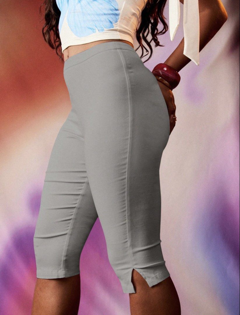 Grey Capri Pants with Side Slits (Category: Other Bottoms) located in Villasis. Submitted by juliaxgamboa (Listing ID 1463515554, Image 2). Description: - Grey capri pants - Cropped length with hem slit - Stretchy material for ultimate comfort - Flattering high-waisted fit - Versatile for casual or dressed-up looks.
