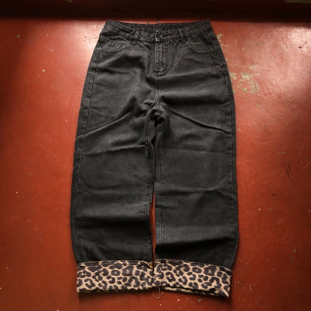 Grey Denim Jeans with Leopard Print Cuffs (Category: Jeans) located in Manila. Submitted by dopethrift.cat (Listing ID 1463405743, Image 1). Description: Dimension: Inches Waist: 32" Length: 36" Thigh: 12" Leghole: 9" mop: gcash ship: lalamove or jnt - Straight leg cut - Cuffs with leopard print lining (wear rolled up or down) - Perfect for casual outfits.