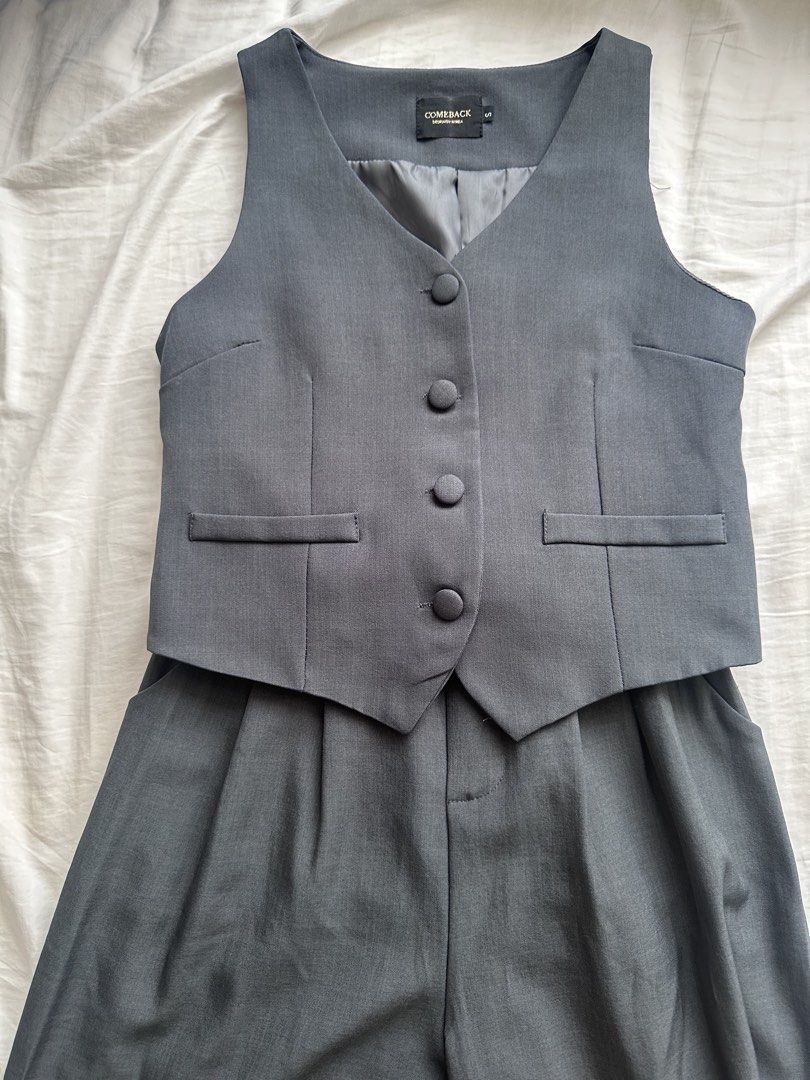 Comeback bkk Grey Vest & Pants Set / coordinates (Category: Sets or Coordinates) located in Taguig. Submitted by beatrizangela (Listing ID 1463405078, Image 1). Description: - never worn, bought in Bangkok - COMEBACK DESIGN BY KOREA grey vest and pants set - Vest features 4 buttons and 2 front pockets - Pants have an elastic waistband and button closure - Size S - Ideal for a smart casual outfit.