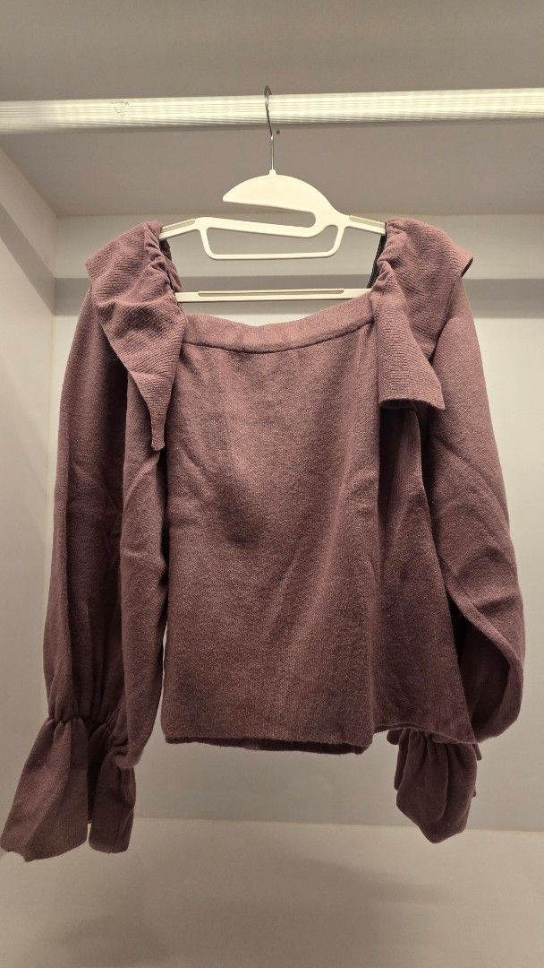 GRL Knit Sweater with Ruffled Cuffs (Category: Longsleeves) located in Mandaluyong City. Submitted by loijiminigo (Listing ID 1463454119, Image 1). Description: - Cute knit sweater from GRL - Features stylish ruffled cuffs - Soft and comfortable material - Estimated size S - Versatile for layering or standalone wear - Easy to pair with jeans or skirts - Bought from Japan.