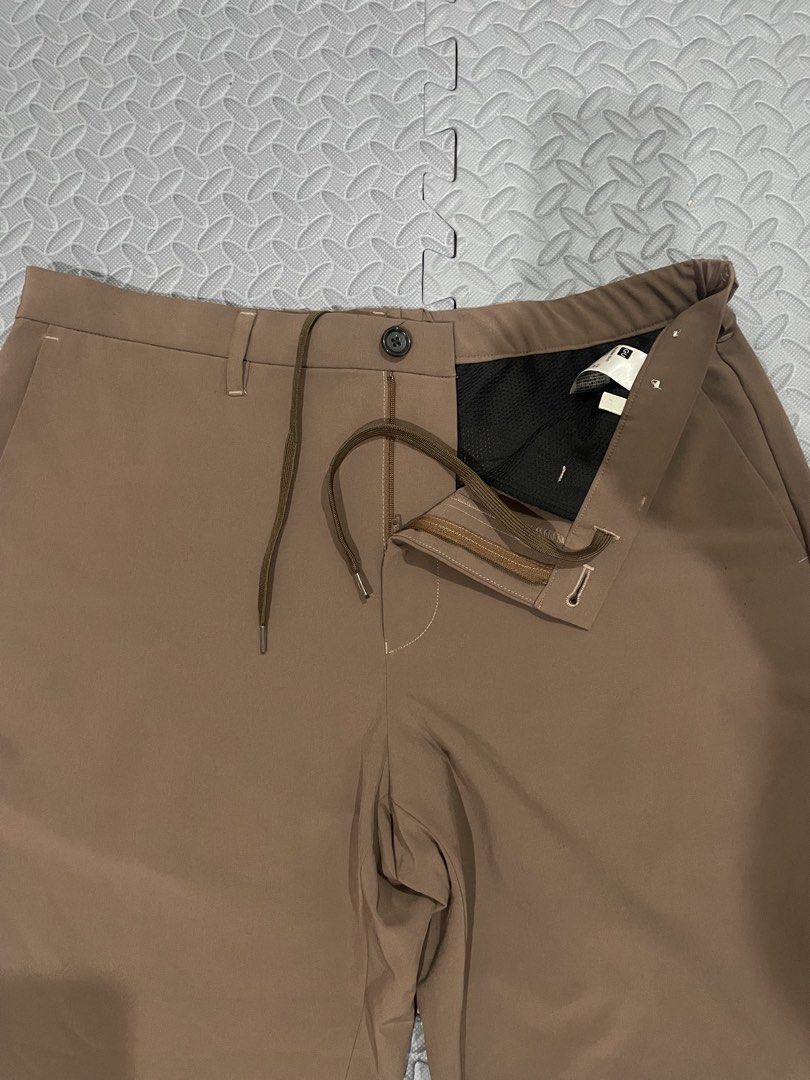 GU Brown Utility Pants with Drawstring Waist (Category: Other Bottoms) located in Lapu Lapu. Submitted by mackoy221524 (Listing ID 1463428647, Image 3). Description: - Brand: GU - Color: Brown - Style: Utility Pants - Features: Drawstring waist, button closure, 2 back pockets, 2 side pockets - Material: Polyester and Polyurethane blend - Extras: Comes with spare buttons - Ideal for: Casual wear.