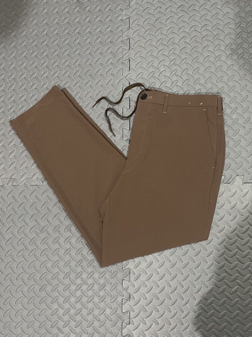 GU Brown Utility Pants with Drawstring Waist (Category: Other Bottoms) located in Lapu Lapu. Submitted by mackoy221524 (Listing ID 1463428647, Image 1). Description: - Brand: GU - Color: Brown - Style: Utility Pants - Features: Drawstring waist, button closure, 2 back pockets, 2 side pockets - Material: Polyester and Polyurethane blend - Extras: Comes with spare buttons - Ideal for: Casual wear.